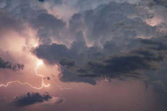 Lightning strike in turbulent Supercell storm clouds over nara visa