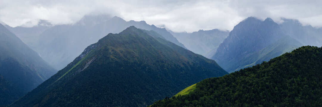 Belang Mountains with forested slopes