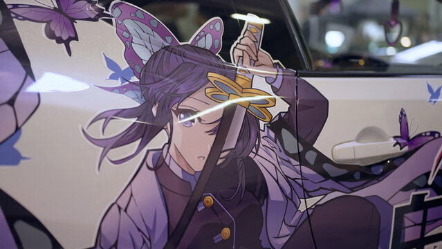 Car wrapped itasha with anime girl Shinobu from Demon Slayer at car exhibition