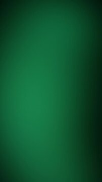 Vertical 9:16 soft glowing deep emerald green lights drifting on dark background, seamless abstract gradient loop for nature, wellness and premium branding