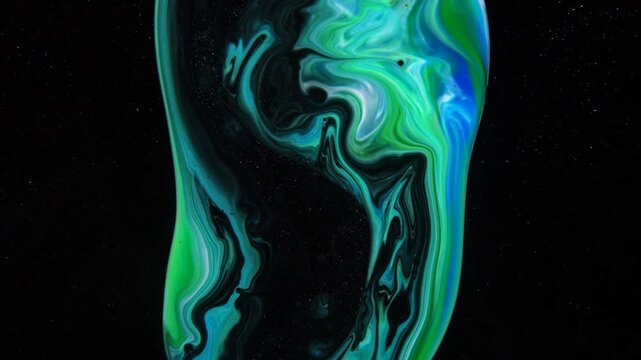 An abstract, blurred figure spreading out to the sides, shimmering with hues of blue, green, and white &mdash; a mesmerizing cosmic pattern on a black background.