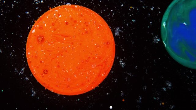 In the black abyss, an abstract droplet swirls, resembling the Sun; on the side, there&rsquo;s an abstract droplet symbolizing the Earth&nbsp;&mdash;&nbsp;the concept of astrology.