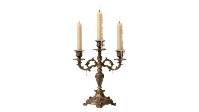 Antique ornate brass candelabra with three lit candles, isolated on transparent background