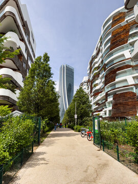 Milan's CityLife: The iconic Generali Tower overlooks modern residences and a vibrant green promenade.