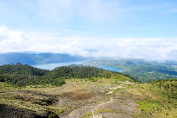 Fototapeta premium High angle view of Lake Talang and Lake Dibawah seen from the slopes of Mount Talang in Solok, West Sumatera, Indonesia