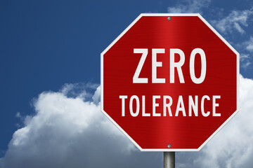 Red Zero Tolerance sign with sky © Karen Roach
