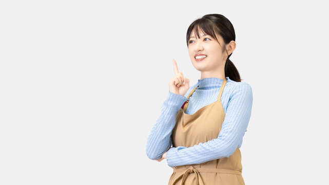 アイデアを思いついたエプロン姿の女性, Woman in an Apron with an Idea