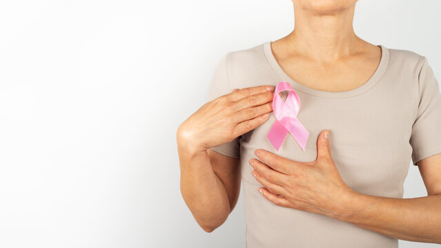 Caucasian Woman Holding Pink Breast Cancer Awareness Ribbon With Copy-Space