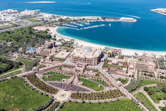 Abu Dhabi skyline aerial view photo with Emirates Palace Hotel in Abu Dhabi, United Arab Emirates