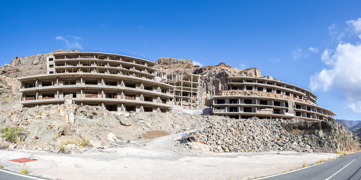Ruins of abandoned building concrete hotel lost place panorama on Gran Canaria in Taurito, Spain
