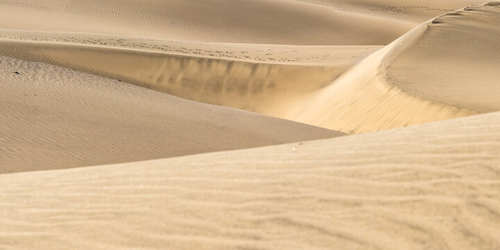 Dunas de Maspalomas sand dunes desert on Gran Canaria island panorama in Spain