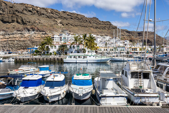 Gran Canaria island boats in Puerto de Mogan port harbor marina on Canary Islands holiday in Spain
