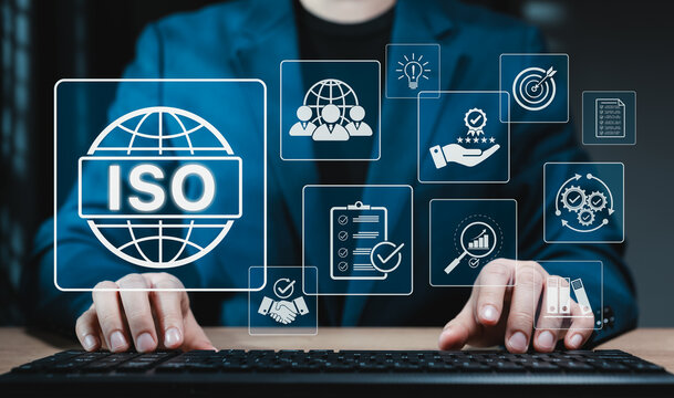 ISO Certification and quality management concept. Businesswoman typing on keyboard computer with ISO certification icons, international standards, compliance, quality management systems, certificate