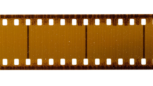 Vintage 35mm film strip with perforations and dust specks, isolated on transparent background