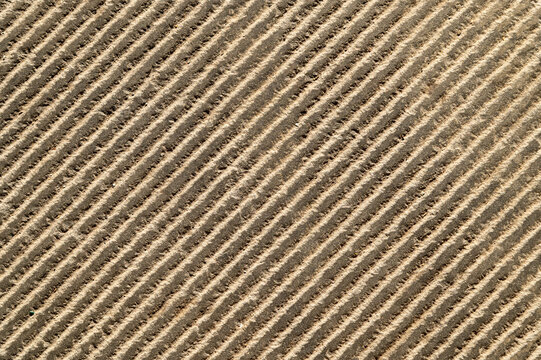 Grooved concrete surface with parallel diagonal lines