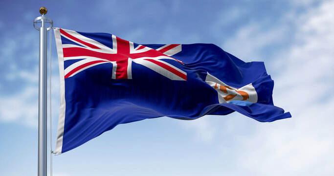 Anguilla Flag waving in the wind on a clear day