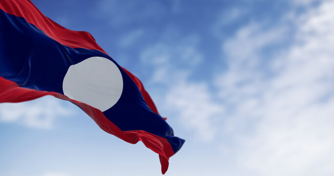 Close-up view of the Laos national flag waving in the wind