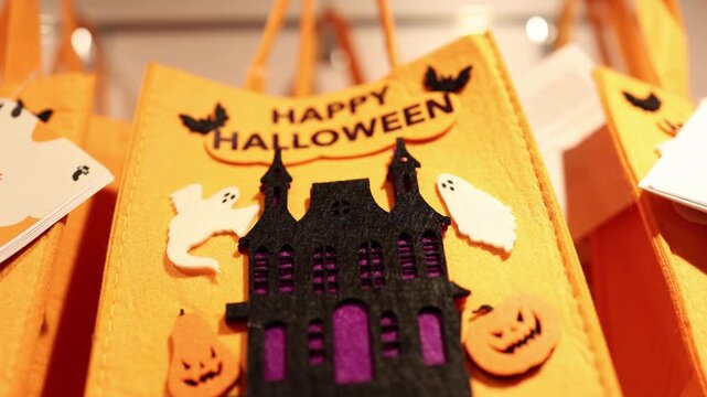 Happy Halloween sign with bats ghosts and haunted house creates cute party decoration for celebrating spooky season with festive handmade decor and autumnal charm indoors