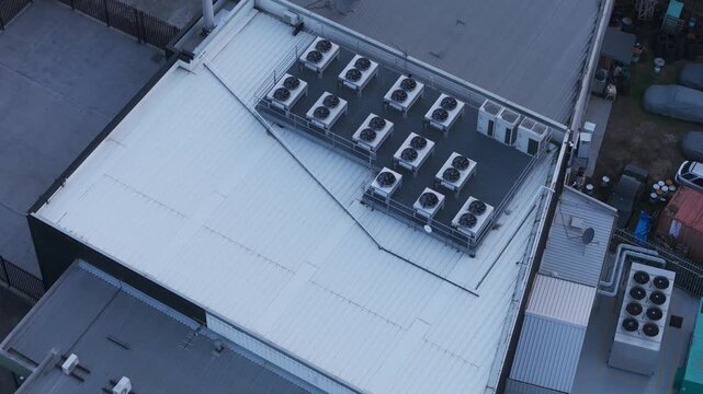 Aerial view of industrial building roof with air conditioning units