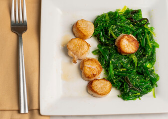 scallops with seaweed salad © dmiller324