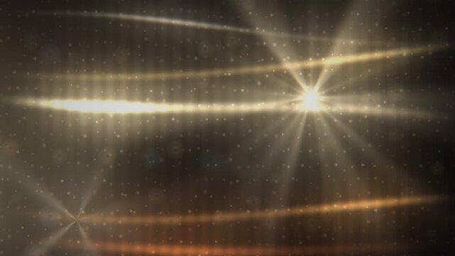 Abstract golden light rays and floating particles stage motion