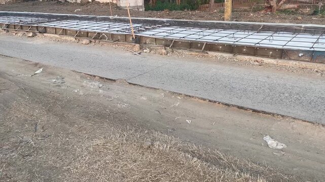 Steel Rebar Grid Installation for Local Road Repair and Rehabilitation