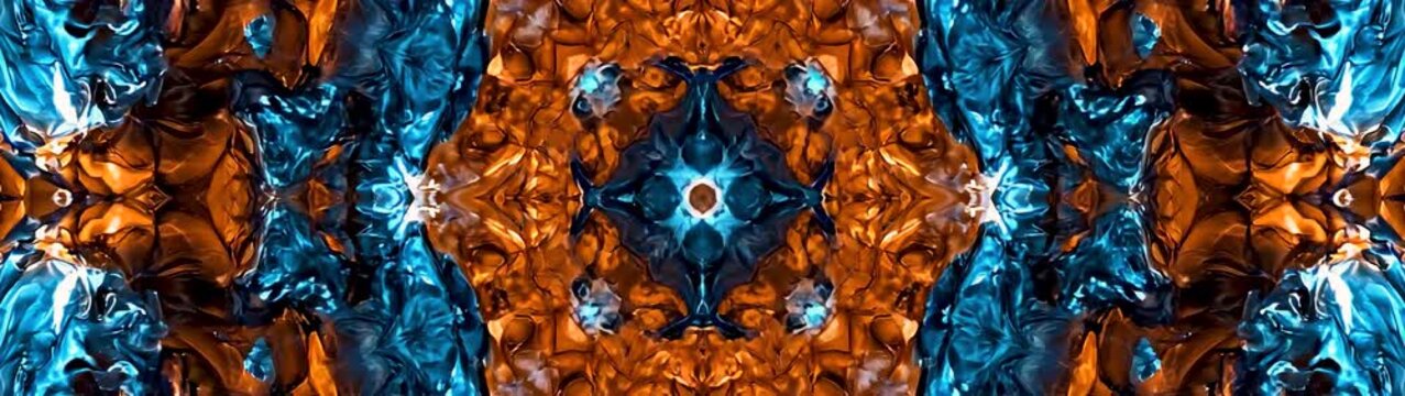Symmetrical pattern forming with shimmering orange and deep blue areas creating a vibrant surface Complex shapes expanding.