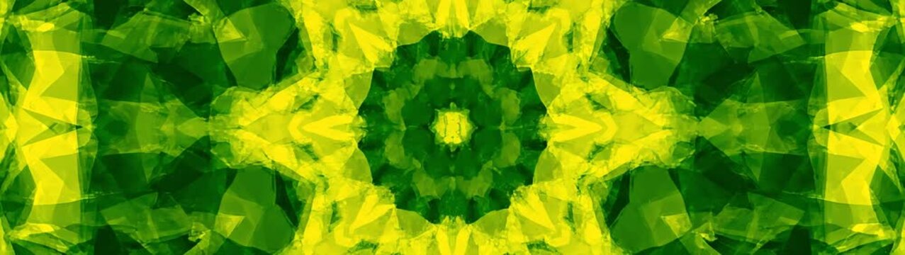 Symmetrical geometric shapes forming a decorative kaleidoscope pattern with various shades of green and yellow.