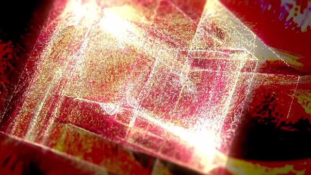 Elegant generative animation of a geometric particle cube dissolving into luminous red, orange and gold forms, creating a dramatic visual atmosphere for fashion shows and runway presentations.