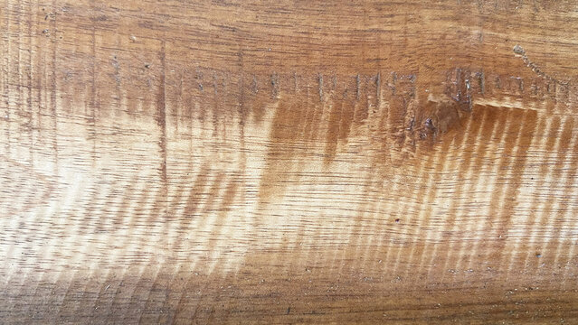 Light brown rough sawn wooden board texture background
