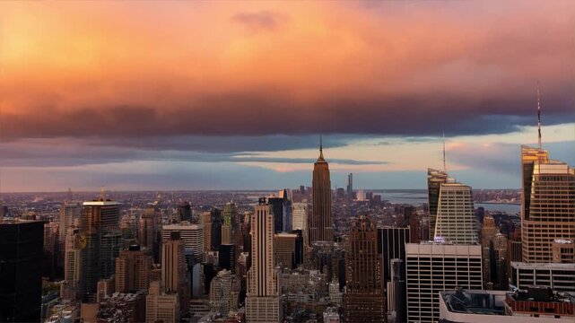 Cinematic city skyline at sunset, urban skyscrapers under dramatic orange clouds, aerial view of metropolitan architecture during golden hour
