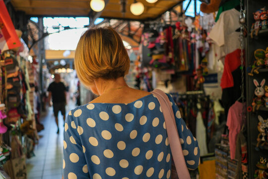 Woman Browsing Stalls at Budapest Market