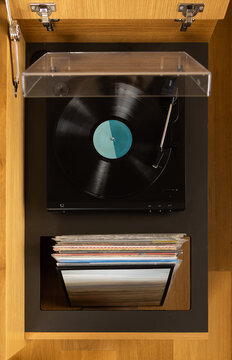 Modern Built-In Record Player Station in Wood Cabinet with Vinyls