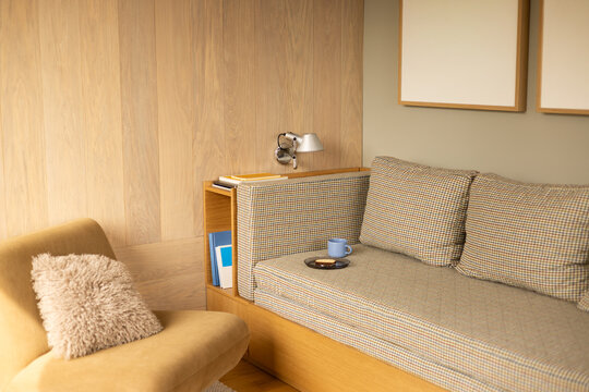 Modern Cabin Seating Area with Houndstooth Couch and Ochre Armchair