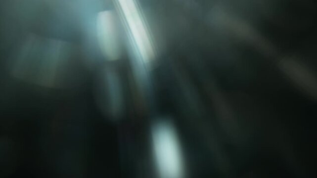 Real Cinematic Lens Flare Overlay on Black Background at 1000fps Slow Motion.