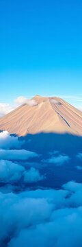 Teide's majestic peak stretches towards the brilliant blue sky, surrounded by clouds, landscape, ||clouds