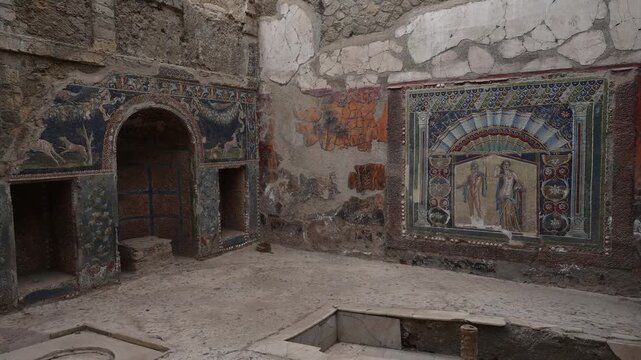 ERCOLANO, ITALY - SEPTEMBER 2026: Ancient Roman wall mosaic depicting Neptune and Amphitrite inside the nymphaeum of the House of Neptune and Amphitrite in Herculaneum.