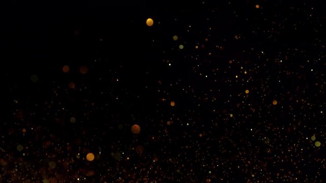 Super Slow Motion Shot of Golden Glittering Luxury Background at 1000fps.