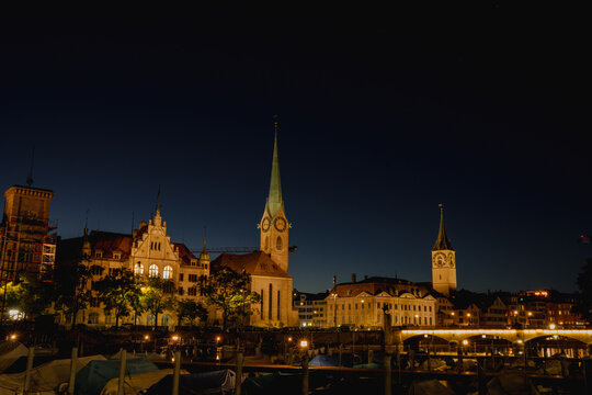 Zurich Old Town skyline at twilight with Fraum&uuml;nster Church and Limmat river, Switzerland