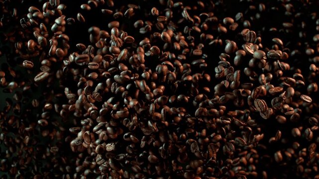 Super Slow Motion Shot of Coffee Beans Exploding Towards the Camera at 1000fps.