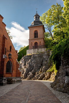 Krakow, Poland - July 18, 2026: Historic bell tower and rear chapels of St. Joseph&rsquo;s Church in the Podgorze district.