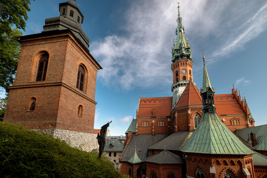Krakow, Poland - July 18, 2026: Spire of St. Joseph&rsquo;s Church rises above buildings in the historic Podgorze district.