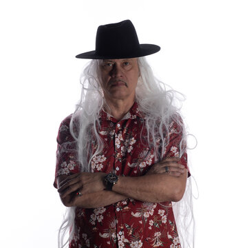 Portrait of an old cowboy in a Hawaiian shirt
