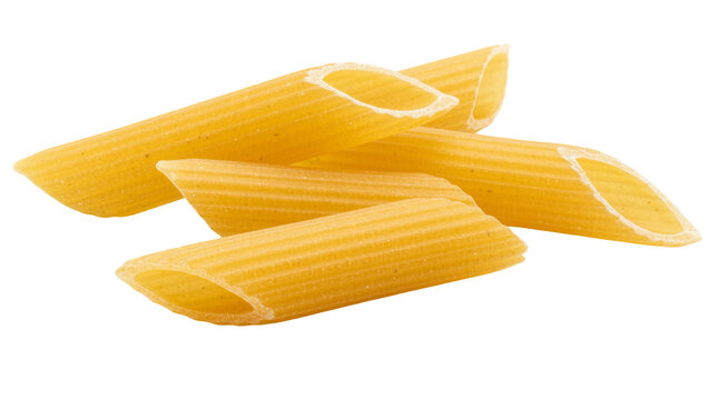 Golden penne rigate pasta tubes dry uncooked durum wheat semolina, isolated on transparent background
