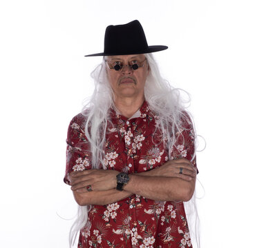 Portrait of an old cowboy in a Hawaiian shirt