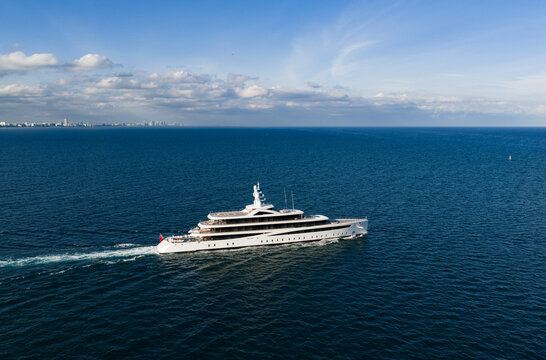 Aerial view motorboat. Luxury lifestyle. Vacation on summer. Yacht at sea. Motorboat aerial top view. Luxury boat motor yacht at sea. Yachting boat tourism. Motorboat gliding through the sea