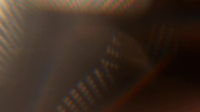 Real Shooted Cinematic Light Flare Overlay on Black Background in Slow Motion.