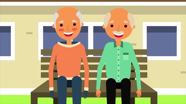 Two happy elderly senior men smiling cheerfully while sitting together on a wooden park bench video clip motion