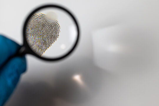 Fingerprint under Magnyfying glass