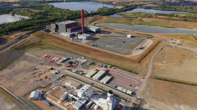 Aerial view of co-located gas turbine power plant and energy recovery facility in Bedfordshire, UK
